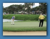 Tom Watson making the winning putt for the Nicklaus/Watson team.